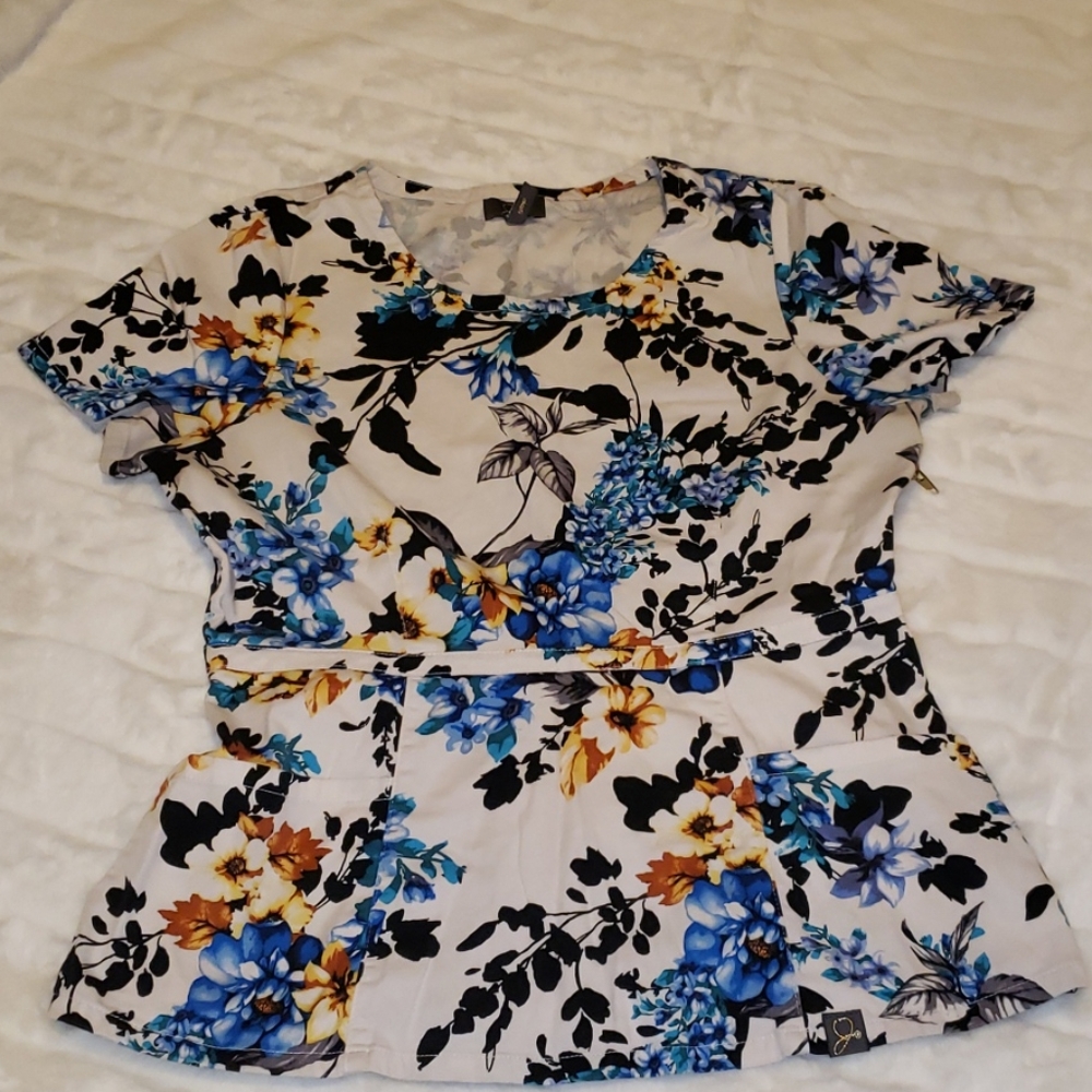 Jaannu floral scrub peplum style top